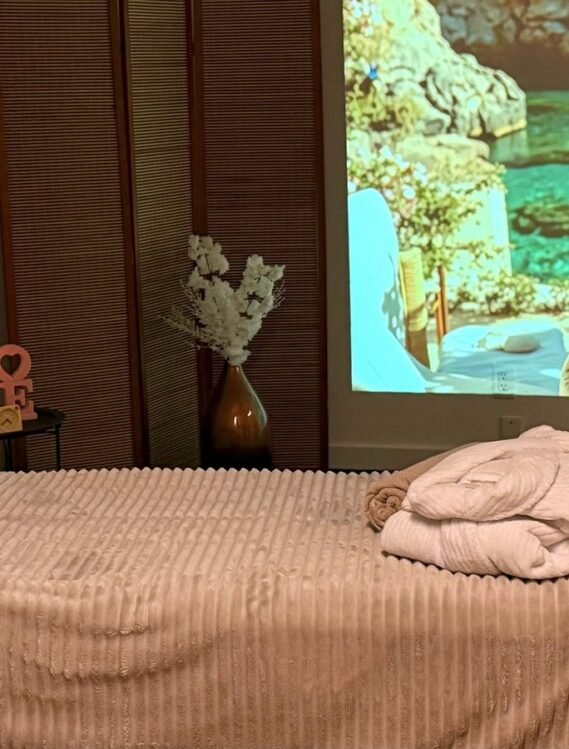 Couples massage room at ERA with a projected landscape