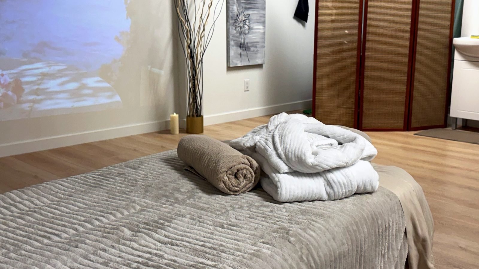 Massage table with fresh towels